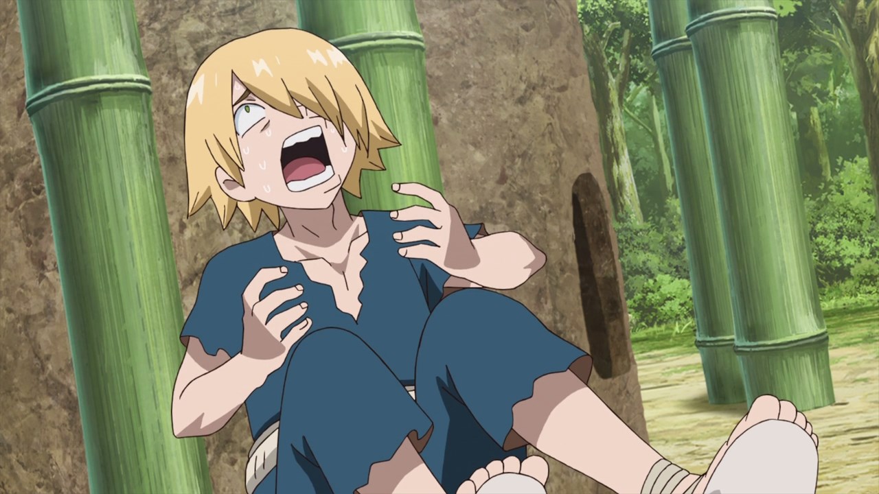 blonde man wearing blue short sleeve shoirt and blue pants