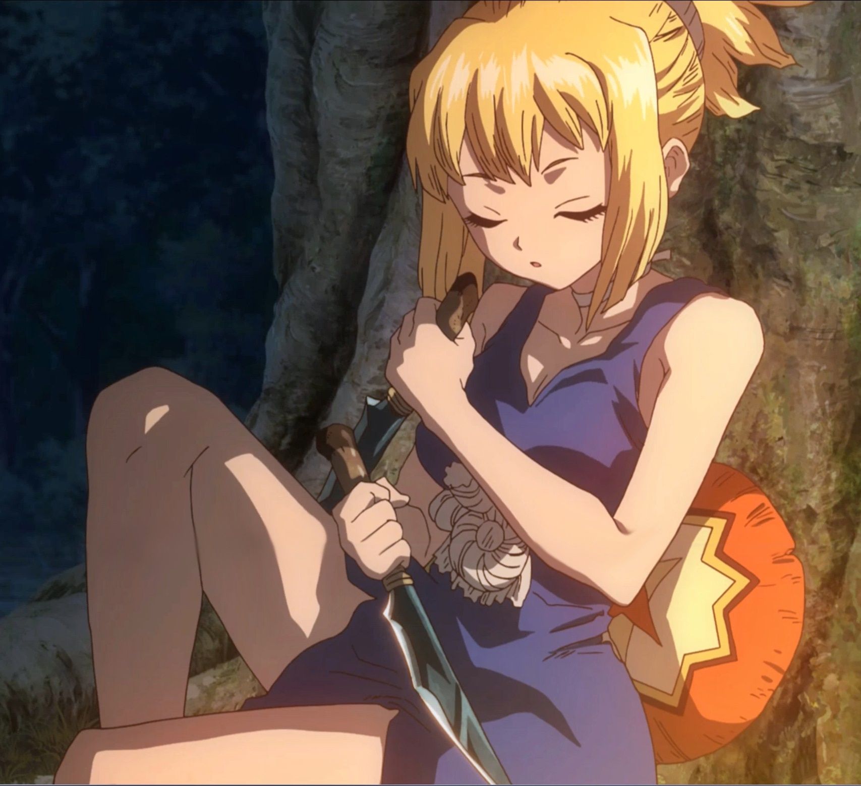 woman with blonde ponytail wearing blue tattered dress